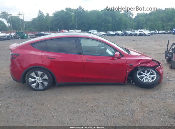 7SAYGDEE4PA116565 2023 TESLA MODEL Y Red Սալոնի հետևի տեսք