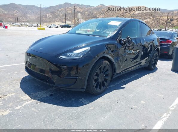 7SAYGDEE4PA126545 2023 TESLA MODEL Y Black Առջևի ձախ երեք քառորդ տեսարան