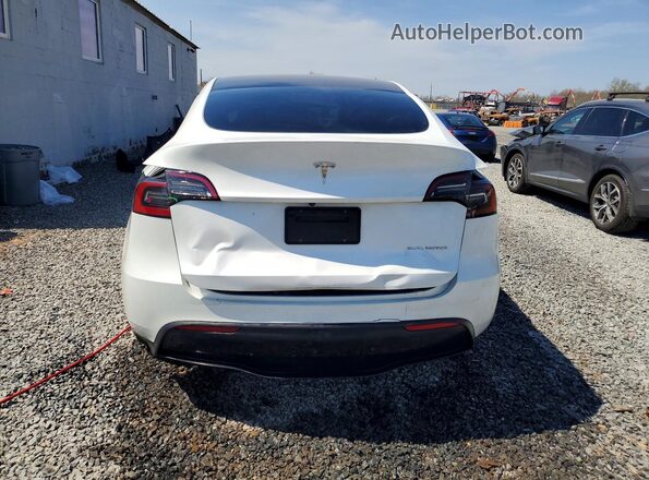7SAYGDEE4PF622061 2023 TESLA MODEL White Հետևի տեսք
