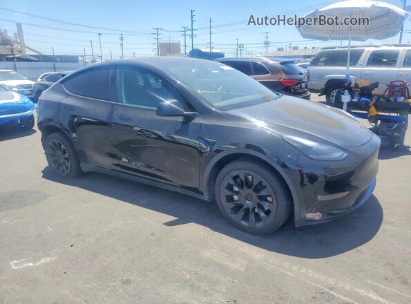 7SAYGDEE4RA216247 2024 TESLA MODEL Черный Передняя правая четверть