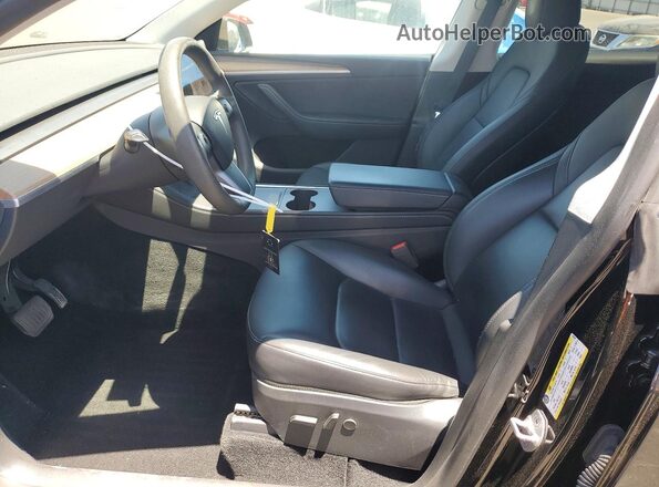 7SAYGDEE4RA216247 2024 TESLA MODEL Черный Вид салона спереди