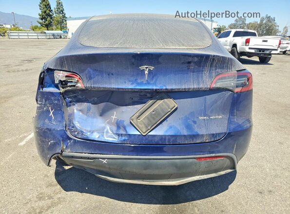 7SAYGDEE4RF083704 2024 TESLA MODEL Blue Vista trasera