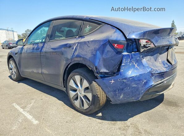 7SAYGDEE4RF083704 2024 TESLA MODEL Blue Trasero izquierdo