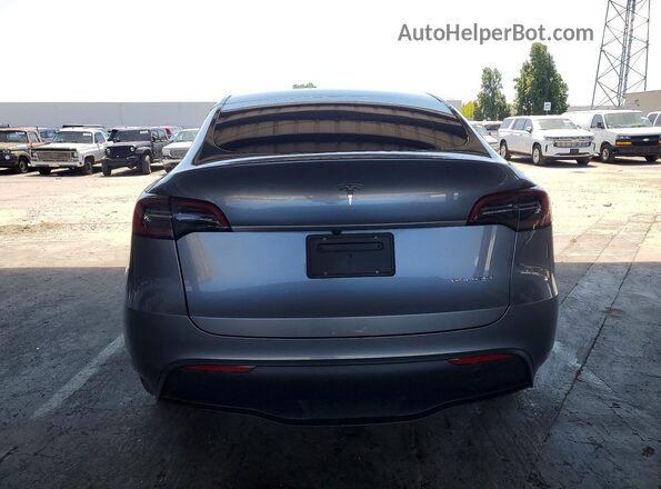 7SAYGDEE4RF154724 2024 TESLA MODEL Silver უკანა ხედი