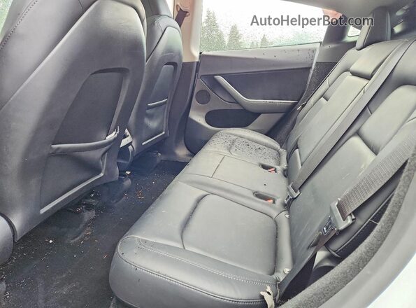 7SAYGDEE4RF190459 2024 TESLA MODEL White უკანა სავარძლების ხედი