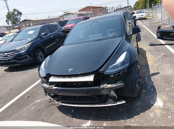 7SAYGDEE4SA359124 2025 TESLA MODEL Y Black Սարքավորումների վահանակի տեսք