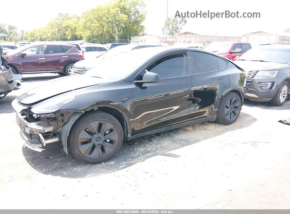 7SAYGDEE4SA359124 2025 TESLA MODEL Y Black Առջևի ձախ երեք քառորդ տեսարան