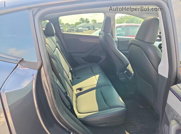 7SAYGDEE4TA391511 2026 TESLA MODEL Gray Vista de los asientos traseros