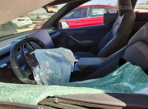 7SAYGDEE4TF580145 2026 TESLA MODEL Черный Вид салона спереди