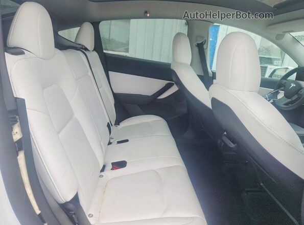7SAYGDEE5NF322185 2022 TESLA MODEL White Rear seats view