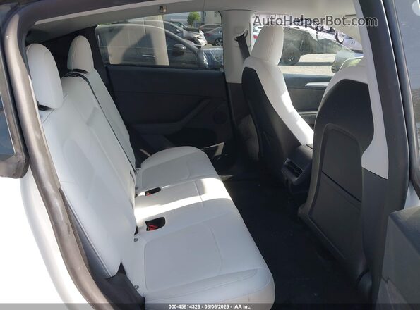 7SAYGDEE5PA120902 2023 TESLA MODEL Y White VIN კოდის სტიკერის ხედი