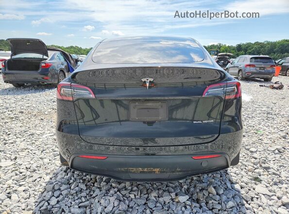 7SAYGDEE5PA138784 2023 TESLA MODEL Black Հետևի տեսք