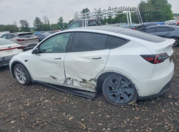 7SAYGDEE5PA143130 2023 TESLA MODEL White Trasero izquierdo