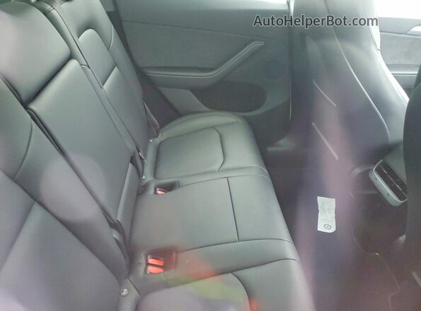 7SAYGDEE5PA143130 2023 TESLA MODEL White Vista de los asientos traseros