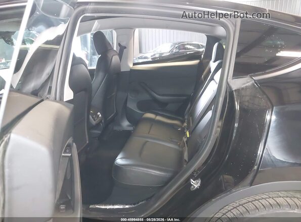 7SAYGDEE5PA180100 2023 TESLA MODEL Y Black VIN կոդի պիտակի տեսք
