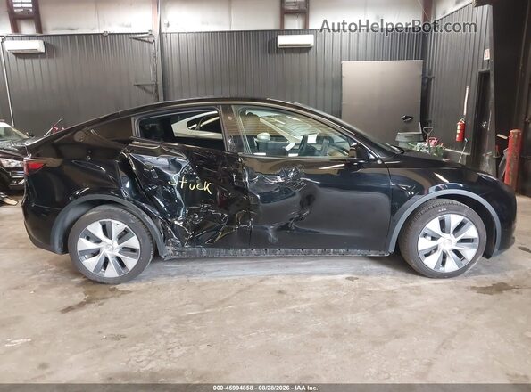 7SAYGDEE5PA180100 2023 TESLA MODEL Y Black Սալոնի հետևի տեսք