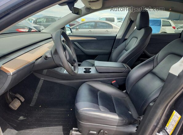 7SAYGDEE5PF893596 2023 TESLA MODEL Charcoal Front interior view