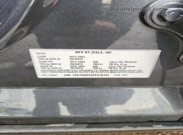 7SAYGDEE5PF916147 2023 TESLA MODEL Charcoal VIN კოდის სტიკერის ხედი