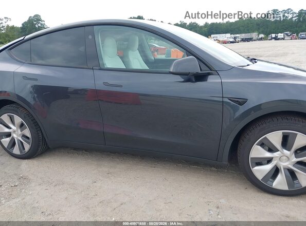 7SAYGDEE5RA283746 2024 TESLA MODEL Y Gray Вид задньої частини салону