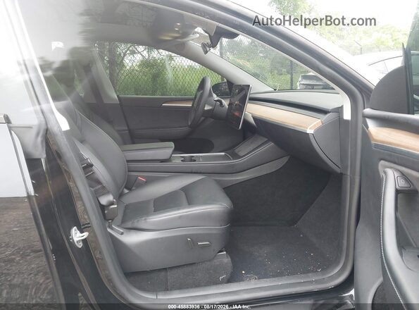 7SAYGDEE5RA323128 2024 TESLA MODEL Y Черный Вид салона спереди