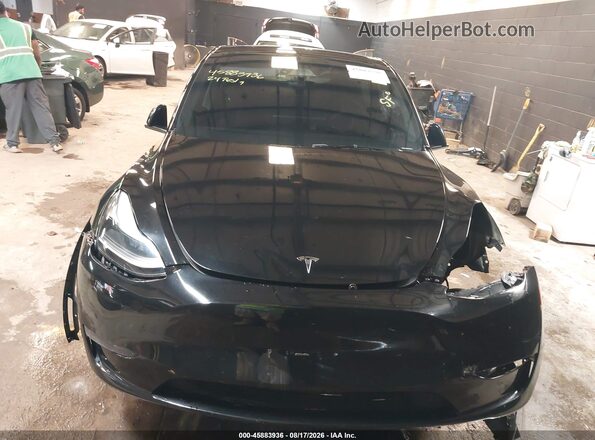 7SAYGDEE5RA323128 2024 TESLA MODEL Y Черный Вид задней части салона
