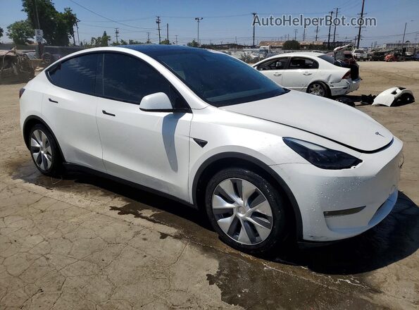 7SAYGDEE5RF081637 2024 TESLA MODEL Белый Передняя правая четверть
