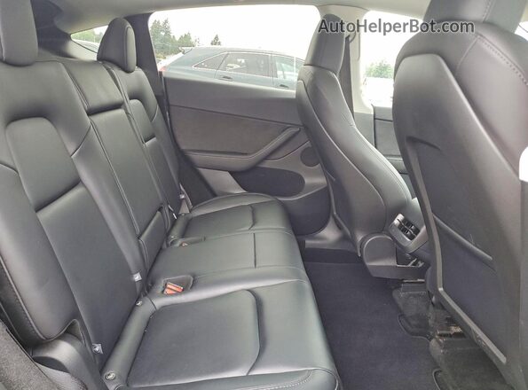7SAYGDEE5SF286509 2025 TESLA MODEL Gray Widok wnętrza z tyłu