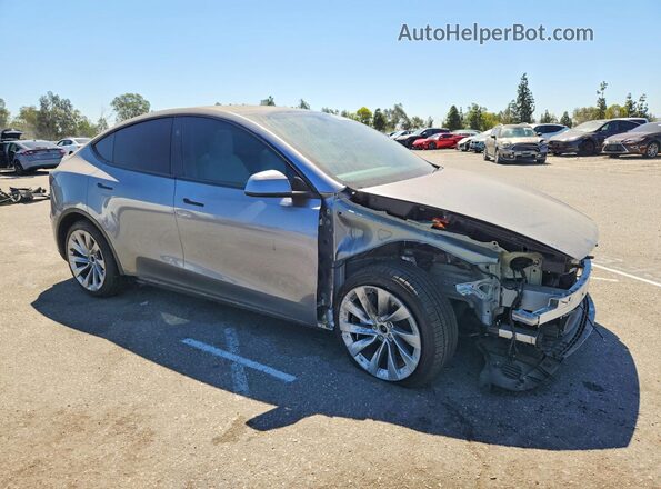 7SAYGDEE5TF329439 2026 TESLA MODEL Gray Delantero derecho