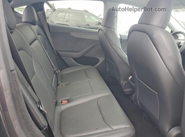 7SAYGDEE5TF540124 2026 TESLA MODEL Black Вид задніх сидінь