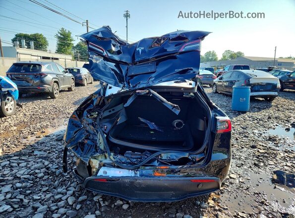 7SAYGDEE6NF444733 2022 TESLA MODEL Black Հետևի տեսք