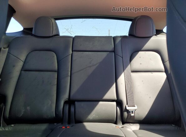 7SAYGDEE6PA053632 2023 TESLA MODEL Red Вид задніх сидінь