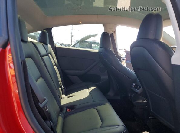 7SAYGDEE6PA053632 2023 TESLA MODEL Red Вид задньої частини салону