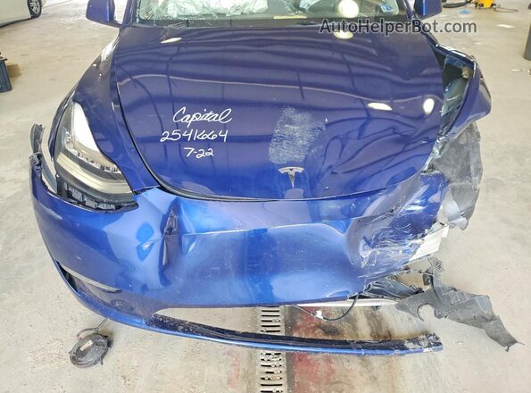 7SAYGDEE6PA079390 2023 TESLA MODEL Blue Rear interior view