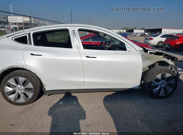 7SAYGDEE6PA113537 2023 TESLA MODEL Y White Vista interior trasera