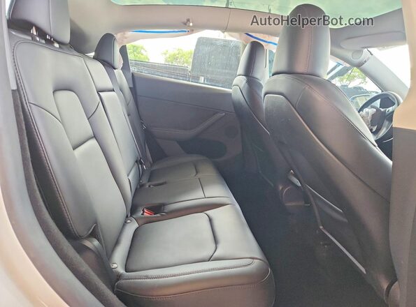 7SAYGDEE6PA138521 2023 TESLA MODEL White Вид задньої частини салону