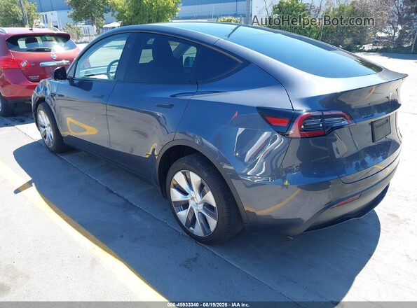 7SAYGDEE6PA194667 2023 TESLA MODEL Y Gray Trasero izquierdo