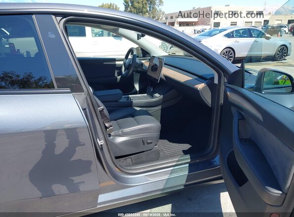 7SAYGDEE6PA194667 2023 TESLA MODEL Y Gray Vista interior delantera