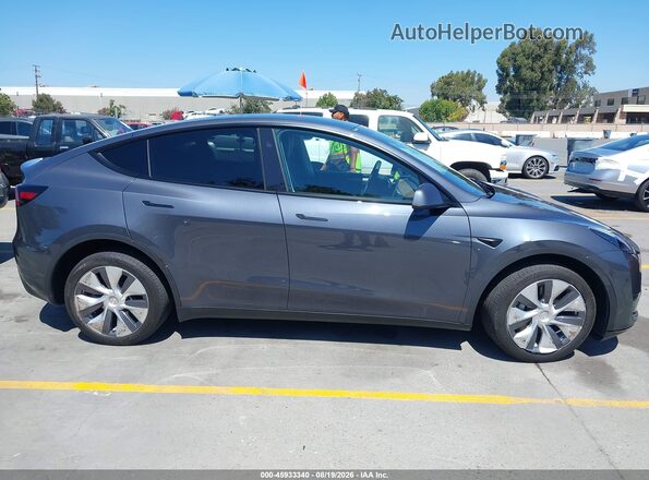 7SAYGDEE6PA194667 2023 TESLA MODEL Y Gray Vista interior trasera