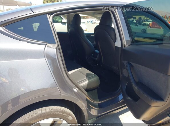 7SAYGDEE6PA194667 2023 TESLA MODEL Y Gray Vista de la etiqueta del VIN