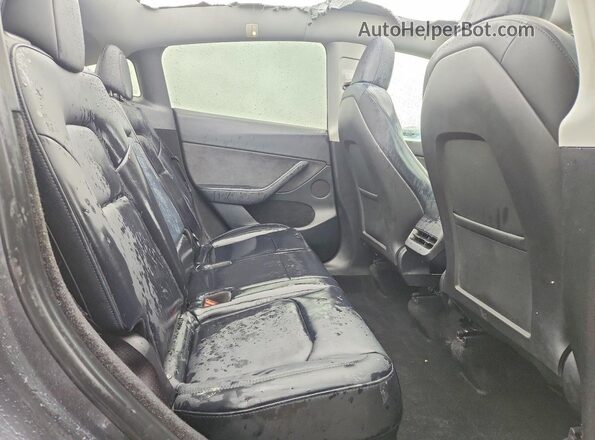 7SAYGDEE6PF944491 2023 TESLA MODEL Y Gray Вид задніх сидінь