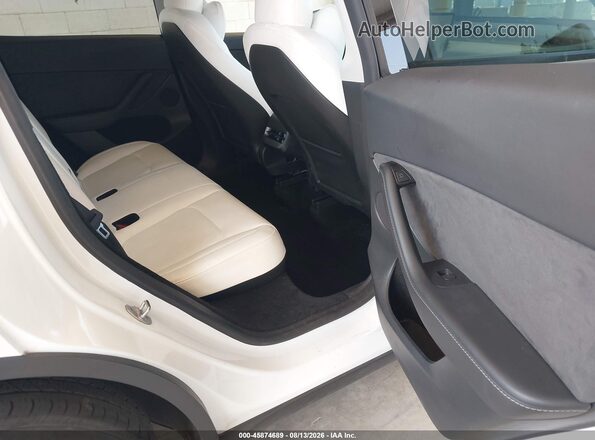 7SAYGDEE6RF051109 2024 TESLA MODEL Y White VIN կոդի պիտակի տեսք