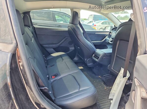 7SAYGDEE6SF307206 2025 TESLA MODEL Black Widok tylnych siedzeń