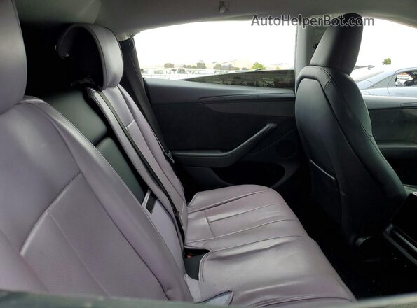 7SAYGDEE6TF350042 2026 TESLA MODEL Black Widok tylnych siedzeń
