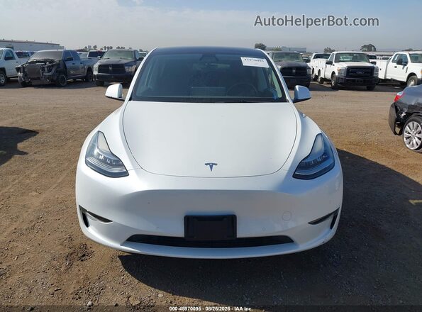7SAYGDEE7NF423390 2022 TESLA MODEL Y White Vista interior trasera