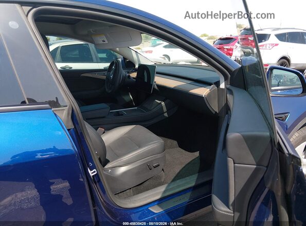 7SAYGDEE7PA126281 2023 TESLA MODEL Y Blue Front interior view