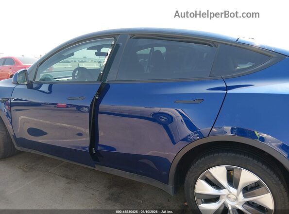 7SAYGDEE7PA126281 2023 TESLA MODEL Y Blue Rear interior view