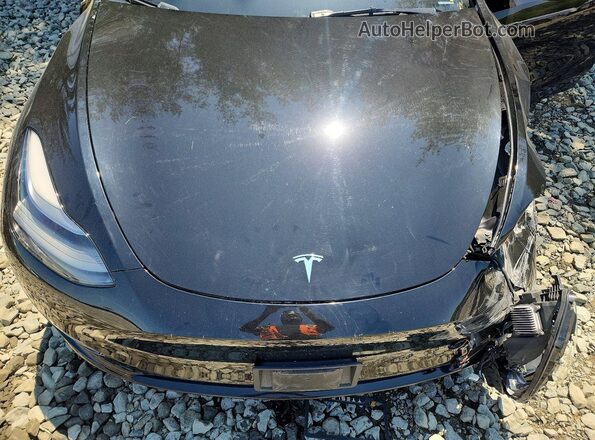 7SAYGDEE7PA188005 2023 TESLA MODEL Черный Вид задней части салона