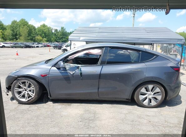 7SAYGDEE7PF614228 2023 TESLA MODEL Y Серый Вид задней части салона