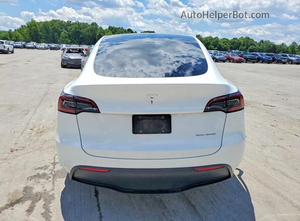 7SAYGDEE7PF674980 2023 TESLA MODEL White Հետևի տեսք