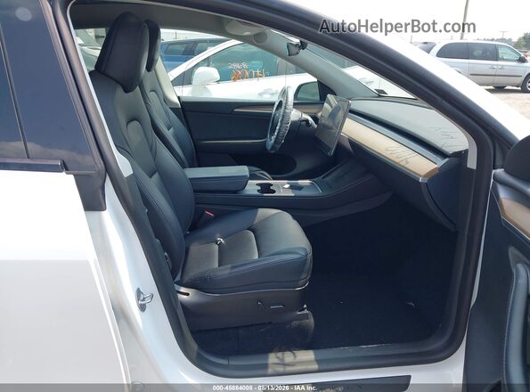 7SAYGDEE7PF703555 2023 TESLA MODEL Y White Вид салону спереду